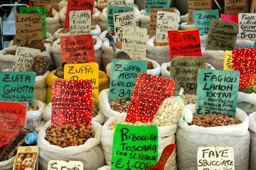 Vibrant assortment of beans and lentils in a Roman market, featuring colorful labels and diverse varieties.